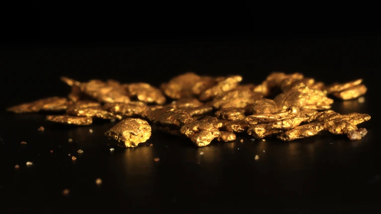 Physicists turn lead into gold — for a fraction of a second