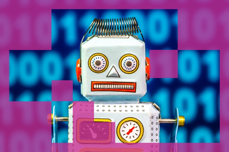 A vintage toy robot made of tin pictured in front of a screen displaying binary code.
