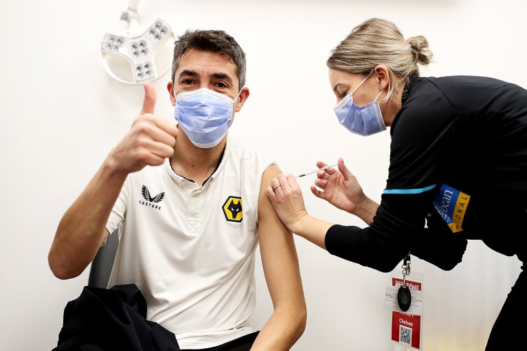Bruno Lage, Manager of Wolverhampton Wanderers, gives a thumbs up as he receives his COVID-19 Booster Vaccination