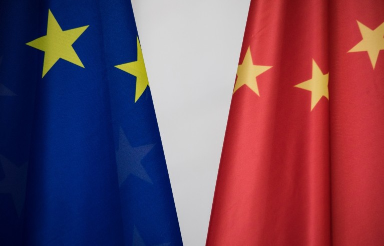 Close-up of Europe and China flags.