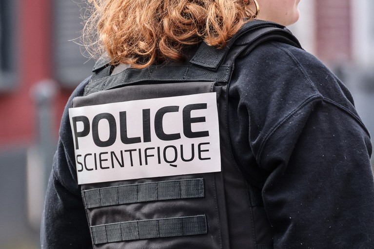 Detail view of the markings on the uniform of a forensics officer of the French police.