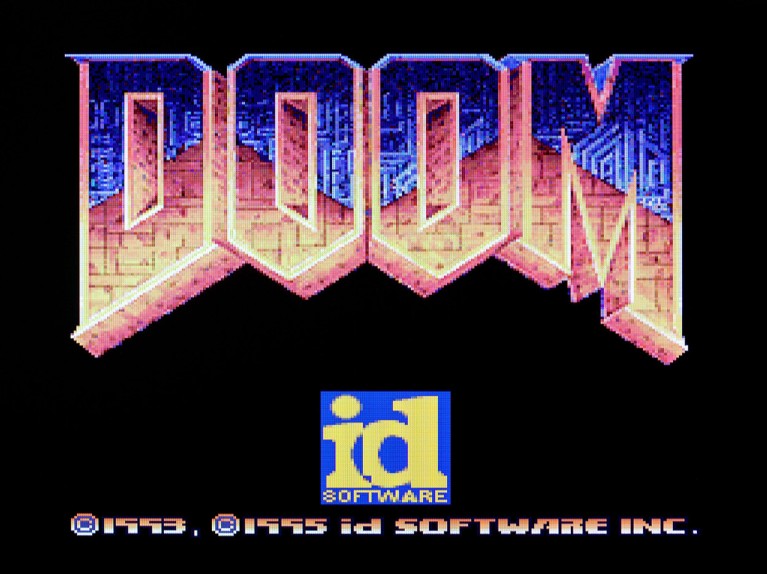 A screenshot of the Doom video game logo running on a Sony Playstation games console.