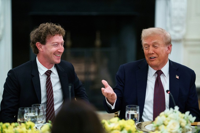 Mark Zuckerberg, CEO of Meta Platforms and US President Donald Trump talk at a dinner with tech leaders in the White House.