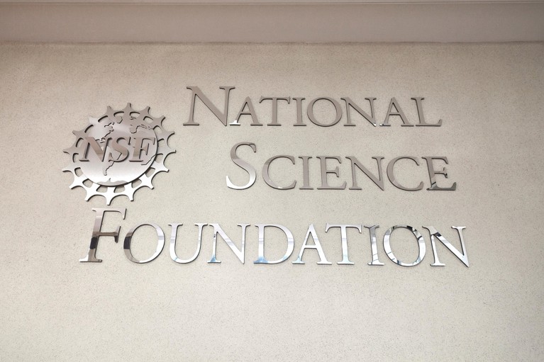 Close-up of the National Science Foundation sign and logo on a building exterior.