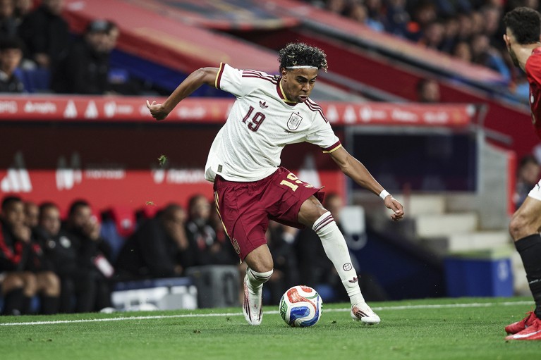 Spain’s Lamine Yamal skillfully controls the ball during a FIFA match against Egypt.