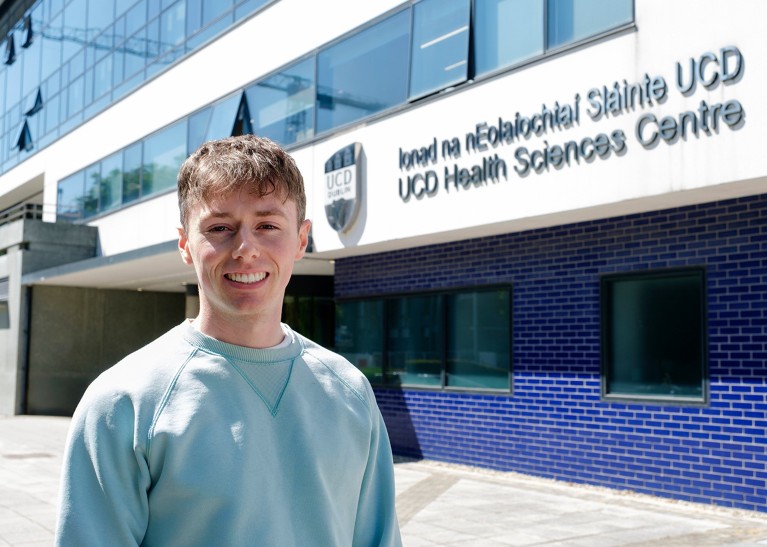 Rory Lambe standing outside the Health Sciences Center at University College Dublin.