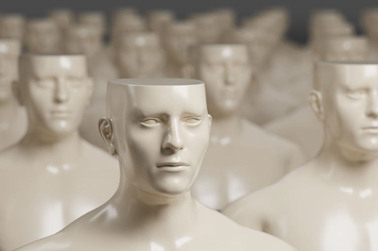 A crowd of mannequins with flat heads.