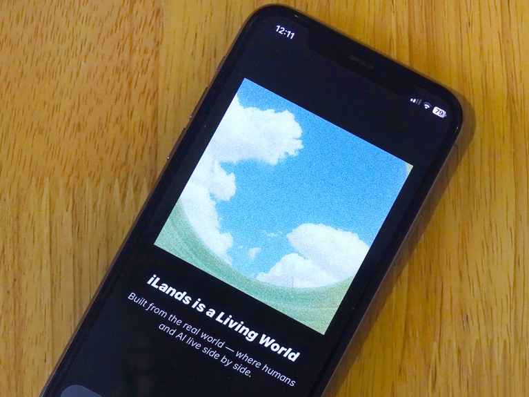 A smartphone screen with the iLands phone app open, showing a grainy image of a blue sky with fluffy clouds.