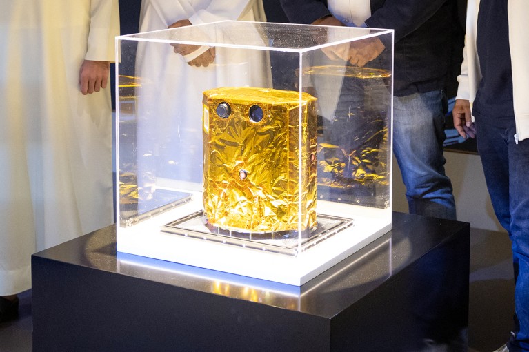 The EMA probe on show at a press conference, shown in a glass case.
