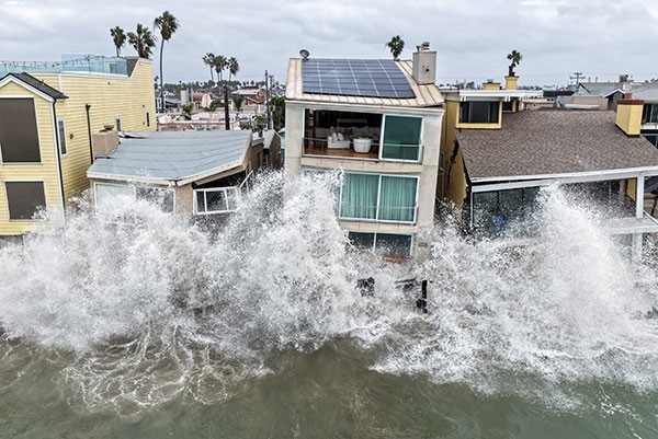 Waves damaged homes in Long Beach, California on Saturday after Tropical Storm Rachel made landfall in northern Baja California, Mexico.