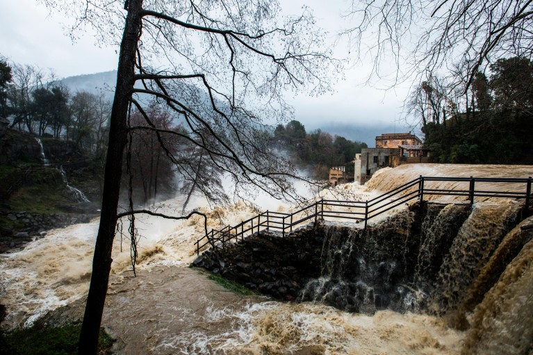 Floodwater cascades down a flight of stairs in Girona, Spain.
