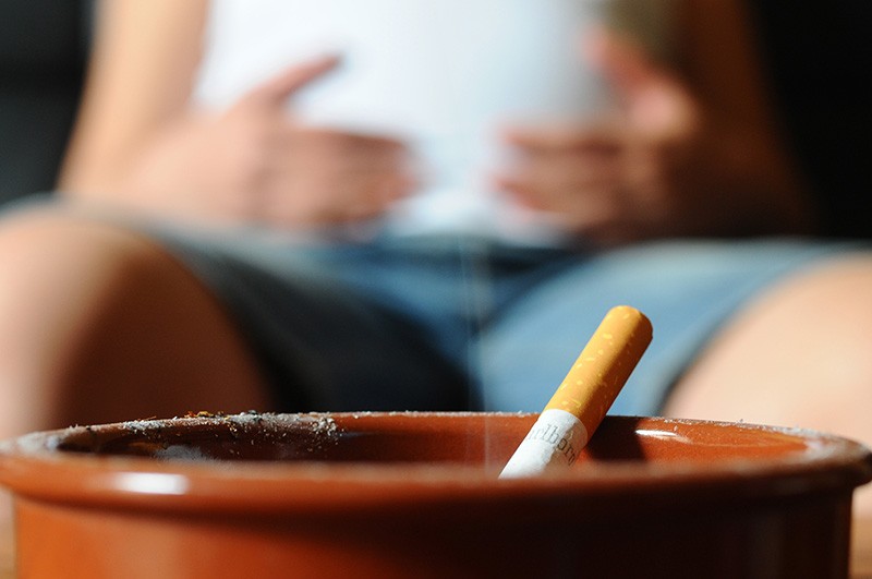 Pregnant woman smoking