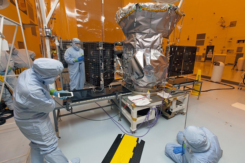 Technicians work on the TESS Satellite