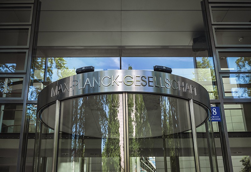 View of the Max-Planck-Gesellschaft sign outside the doors to the General Administration building, Max Planck Society, Germany.