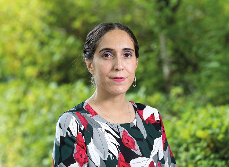 Lynn Kamerlin smiles during an outdoor portrait.Uppsala University.