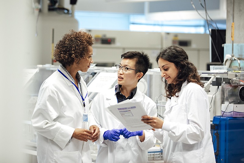 Scientists in a disease research facility