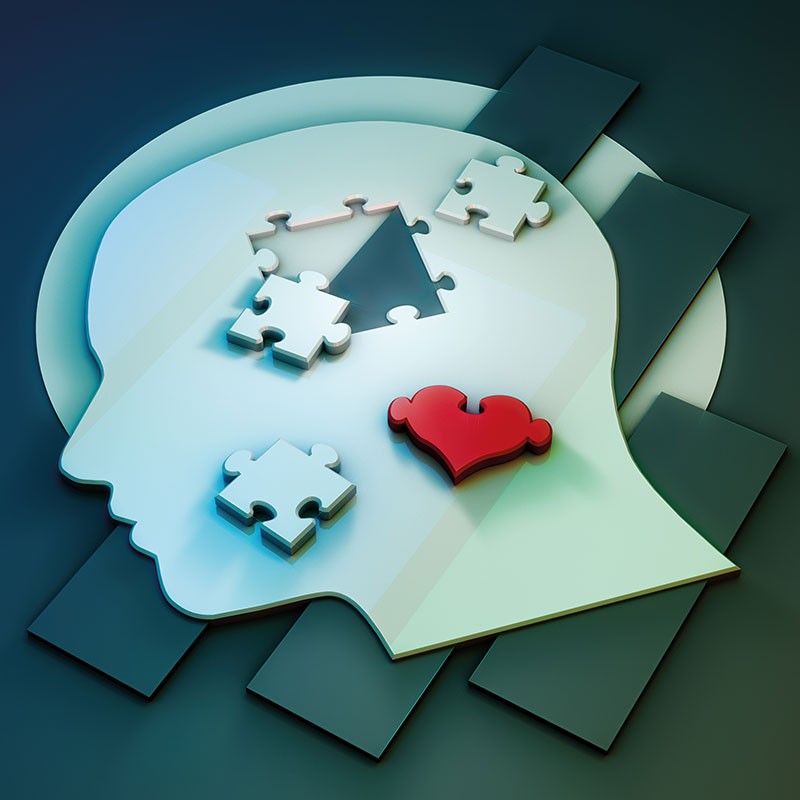Stylized illustration of a human head made up of jigsaw pieces