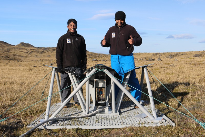 Students Nivek Ghazi and Liju Philip with newly reinstalled front-end electronics in the PRIZM 100 MHz antenna on Marion Island