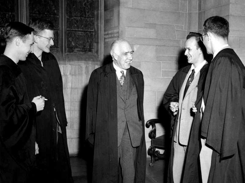 L-R: Charles Misner, Hale Trotter, Niels Bohr, Hugh Everett and David Harrison talking at Princeton