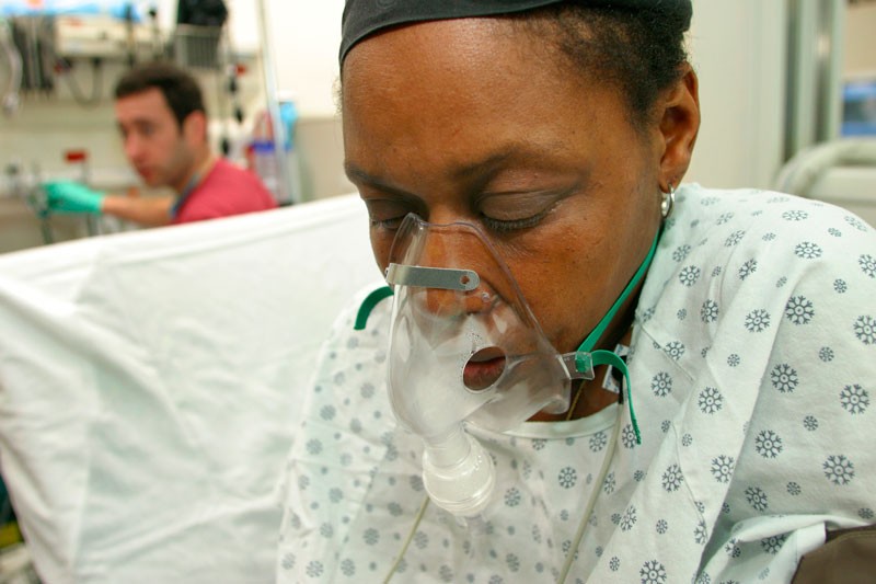 An African American woman in the emergency room of San Francisco General Hospital.
