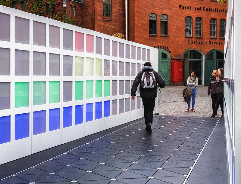 Photo of energy harvesting pathway, a colourful, interactive installation.