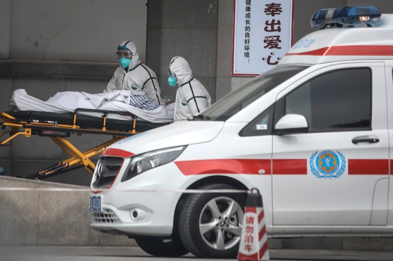 Medical staff transfer patients to Jin Yintan hospital in Wuhan, Hubei, China