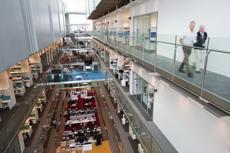 A view from the central atrium of the Francis Crick Institute showing labs and offices over several floors