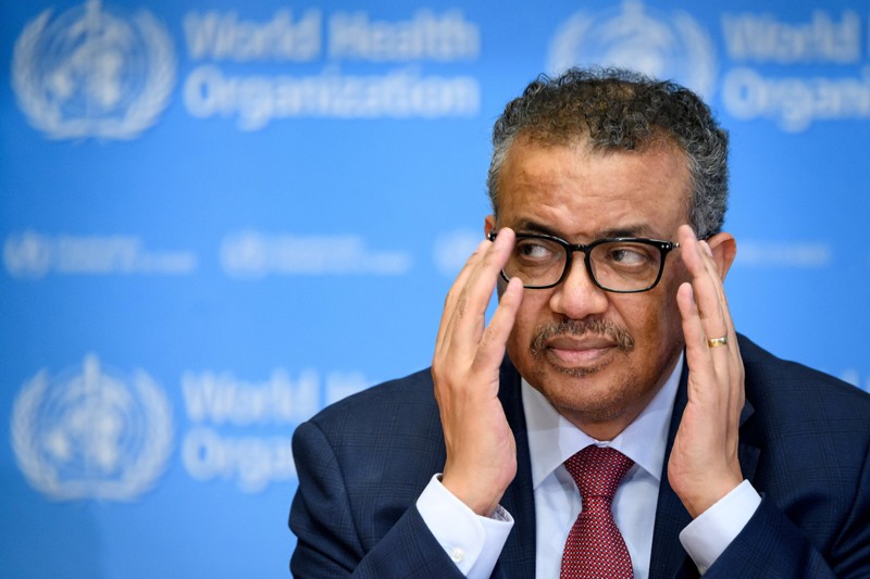 Tedros Adhanom Ghebreyesus touches his glasses during a briefing at the World Health Organisation headquarters