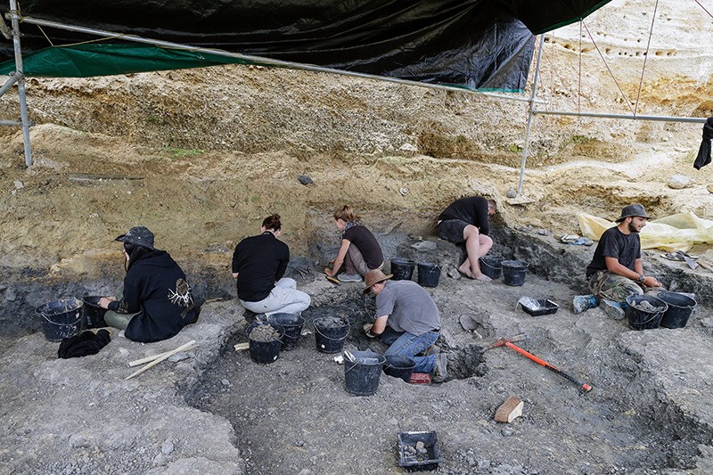 Volunteers carry out an excavation on the archaeological site of Angeac-Charente in France.