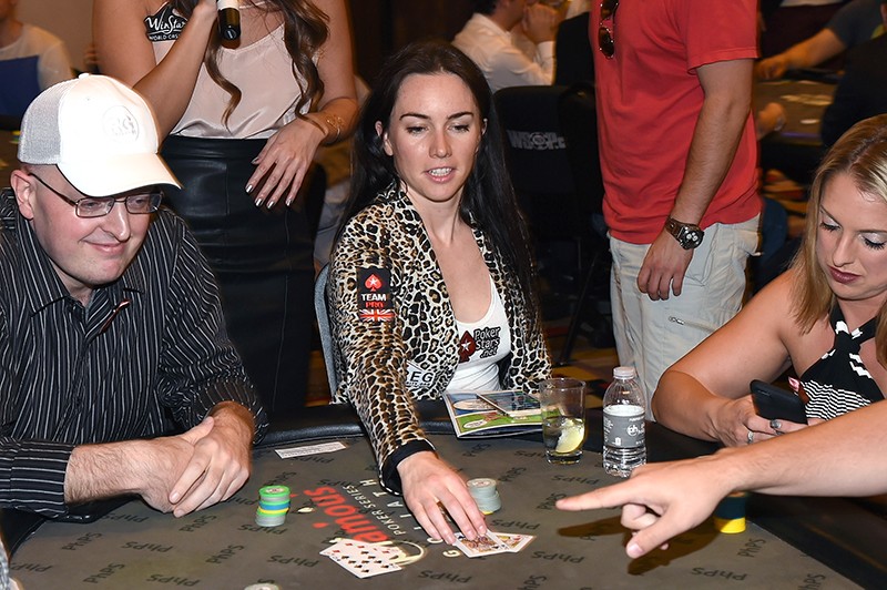 Professional poker players at a tournament table