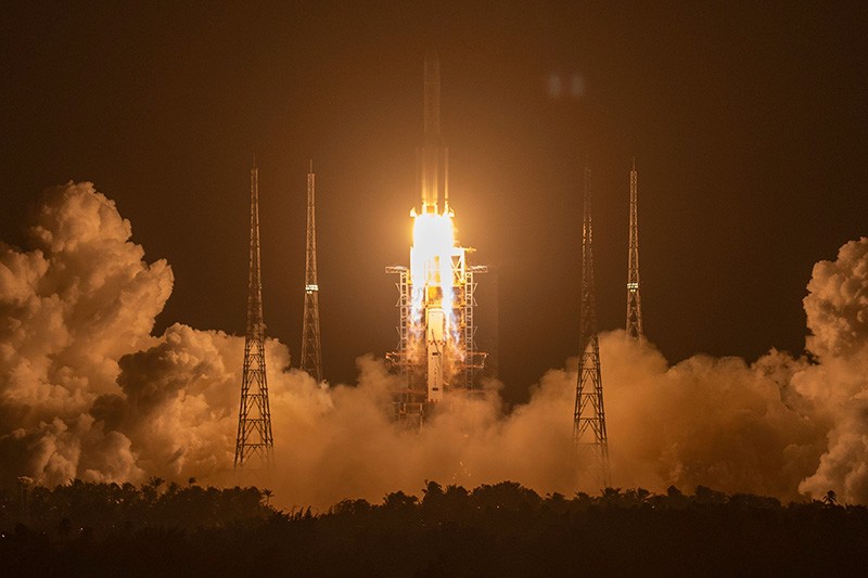 A Long March-5 rocket carrying the Chang'e 5 lunar mission lifts off at the Wenchang Space Launch Center in China