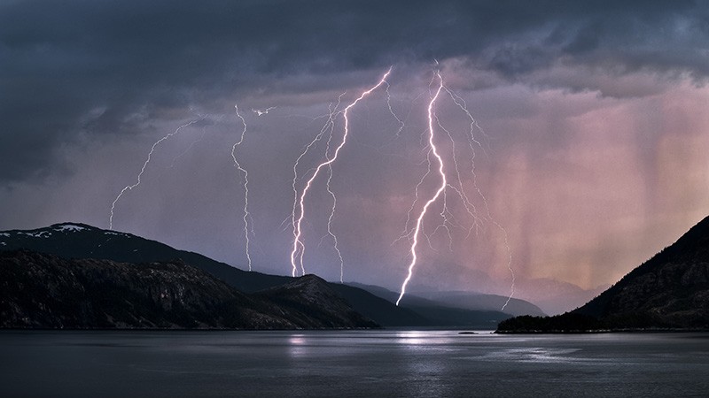 The aurora borealis during a lightning storm in Norway.