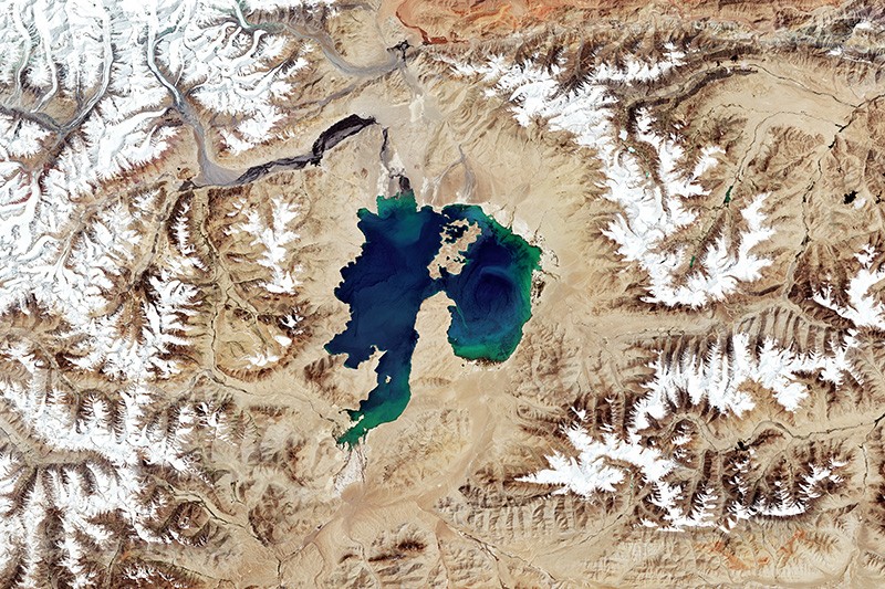 Satellite photo of Karakul Lake located in the Pamir Mountains of Tajikistan