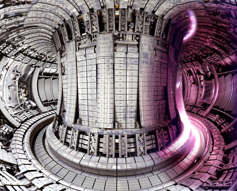 A section of pink plasma superimposed on JET vessel equipped with the ITER-Like wall