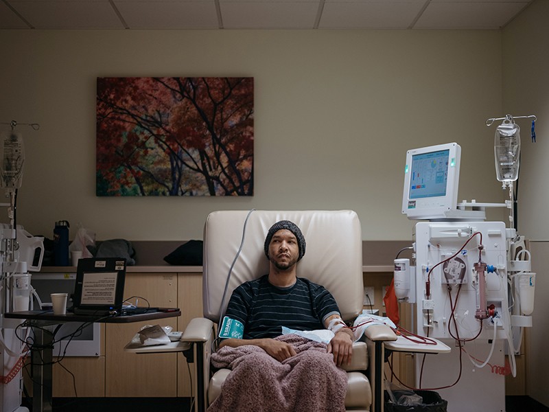 A patient sits for one of three weekly, four-hour dialysis sessions at the Northwest Kidney Centers in Washington, US