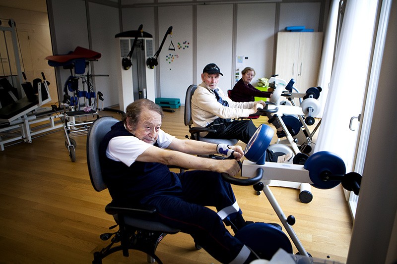Patients exercise in a specialised day care centre in Switzerland for people suffering from Parkinson's disease