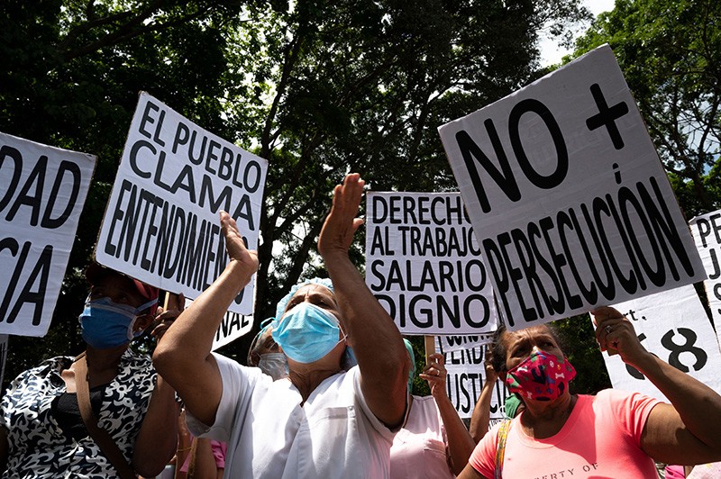 Heath-care workers protest against their poor treatment and inadequate hospital responses to COVID-19 in Caracas, Venezuela.