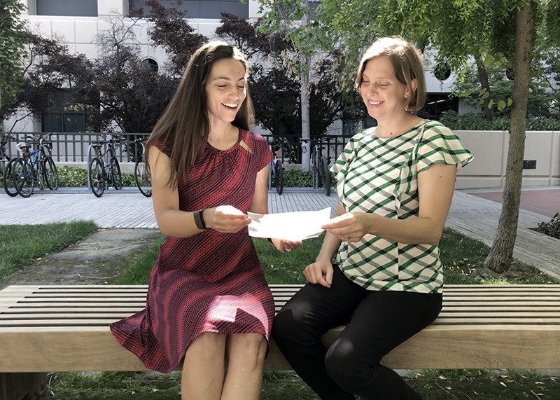 Jennifer Wilson and Crystal Botham during a grant proposal discussion at a university campus in California, US.