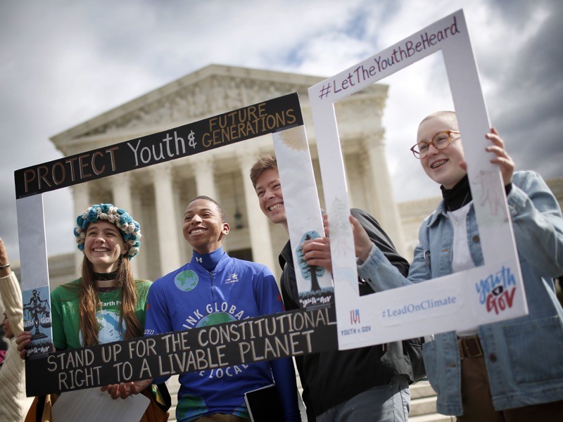 Young protesters attend a rally outside the U.S. Supreme Court, 2018 in Washington, DC.