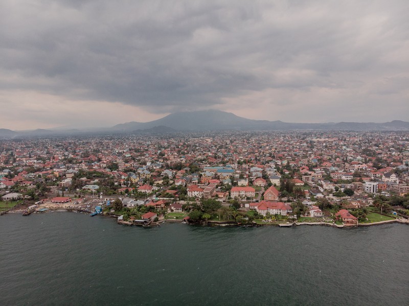 Aerial view of the city of Goma with Lake Kivu and the Nyiragongo volcano.