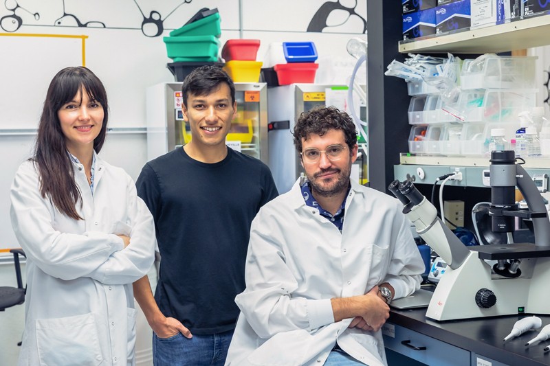 Matt Krisiloff with his two co-founders in the lab
