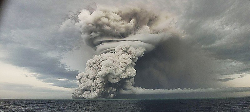Northward view at Hunga Ha'apai on the left foot of the volcanic plume from January 14, 2022.