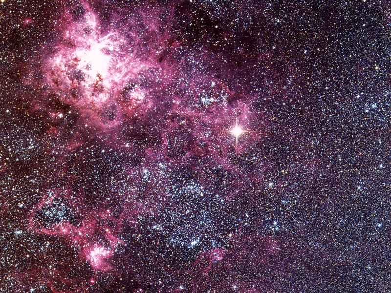 Image obtained with the ESO Schmidt Telescope of the Tarantula Nebula in the Large Magellanic Cloud. Supernova 1987A.