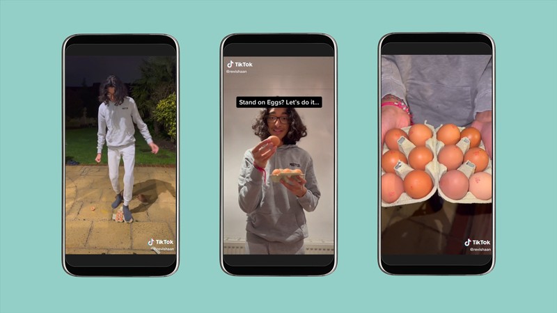 Three mobile phones showing frames from a TikTok video hosted by Ishaan Bhimjiyani standing on egg boxes