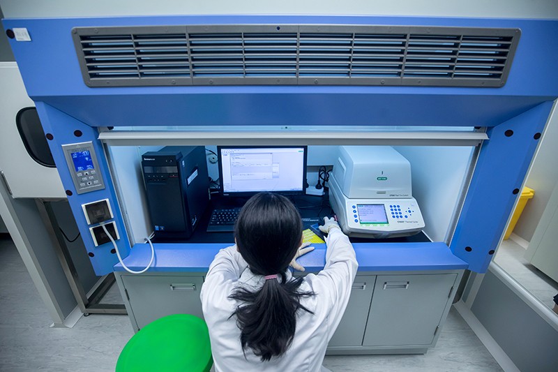 A technition tests DNA at the Gene Discovery laboratory in Hong Kong, China, on June 6, 2019.