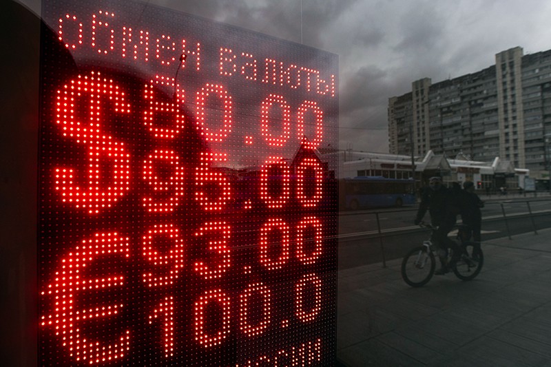 A digital sign displays exchange rates in the window of a currency exchange bureau in Moscow, Russia, on February 24, 2022.