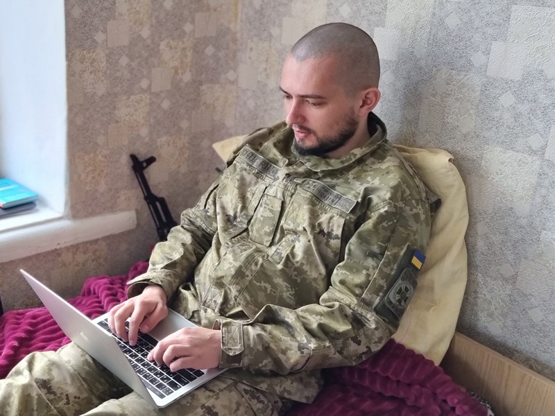 Valerii doing some coding in his room in between breaks from training for combat in unknown location in Ukraine.