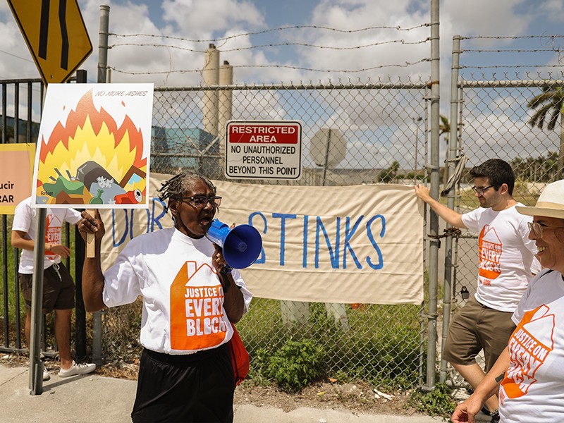 Local residents gather to protest against the pollution and smell generated by the Covanta Energy Incineration Plant.