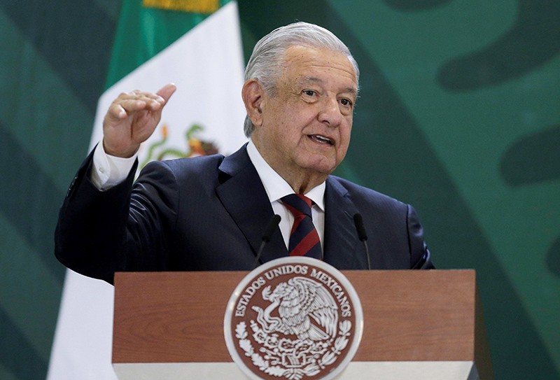 Mexico's President Andres Manuel Lopez Obrador speaks at a podium during a news conference at a military base in Apodaca, Mexico
