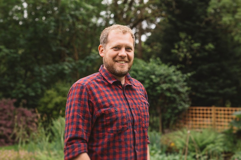 Paul Richmond poses for a portrait in his garden